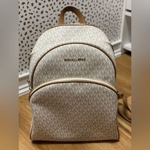 Used Michael Kors white/tan backpack